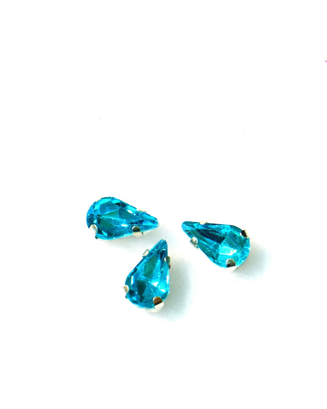 Cristal gota celeste 5x8mm / 10 unidades BASE PLATEADA