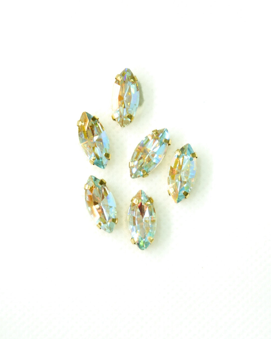 Cristal tornasol blanco 7x15mm/ 6 unidades BASE DORADA