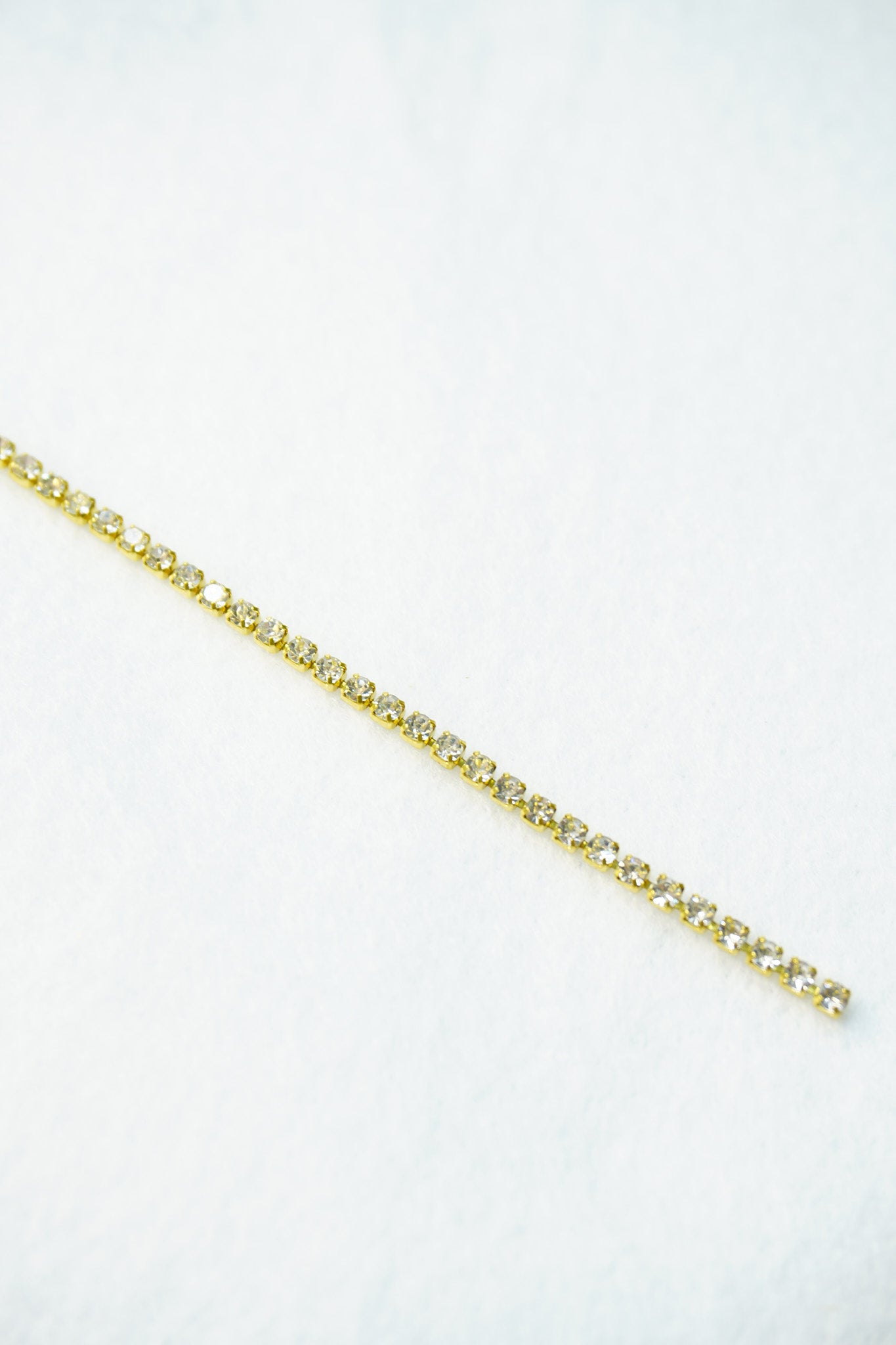 Strass 2mm dorado/ 1 metro