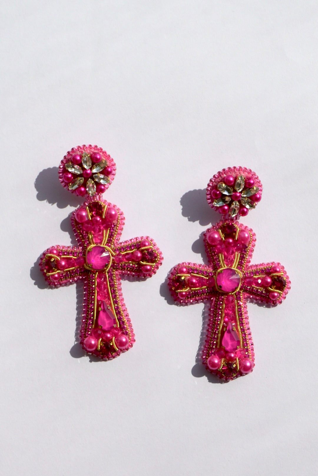 Aros- Cruces Fucsia