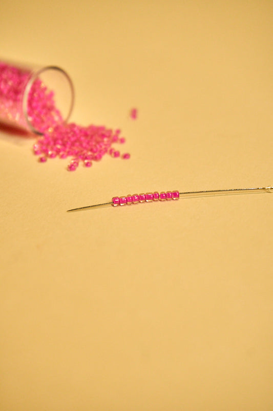 Mostacilla Rocalla FGB 11/0- semicalibrada 10grs | FUCSIA TRANSPARENTE