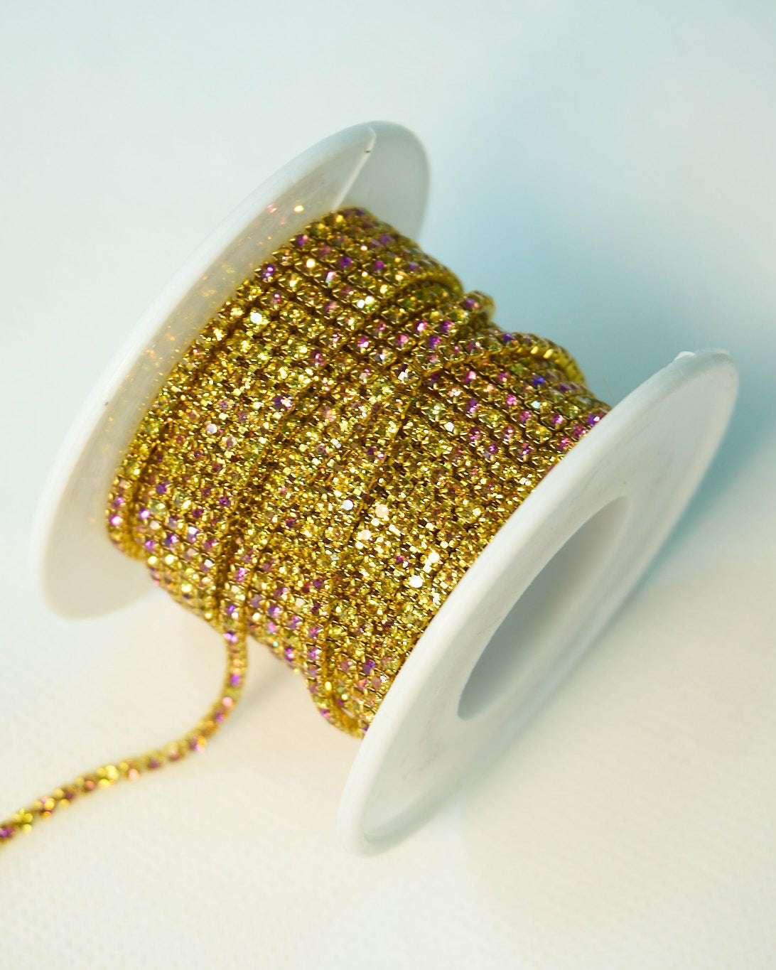 Strass 2mm Dorado-fucsia/  1 metro